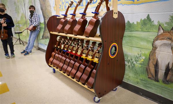 rack of ukuleles